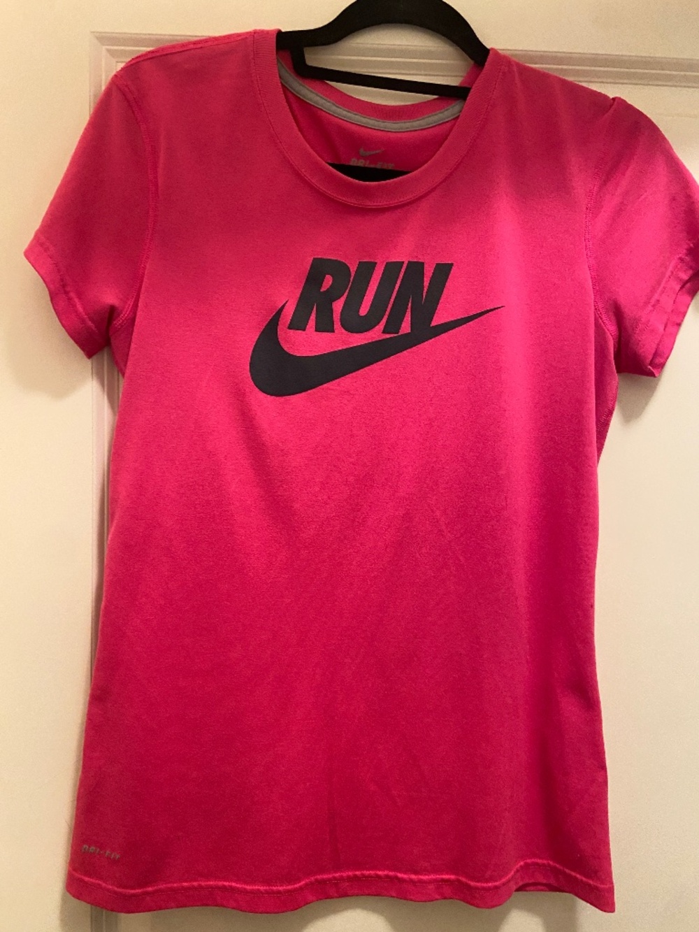 Women's Nike Dri-fit activewear top.